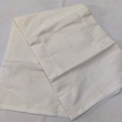 A folded blue Kota cotton plain saree with a solid pattern, displayed on a white background.