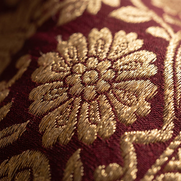 Gold zari floral brocade woven into maroon Banarasi silk